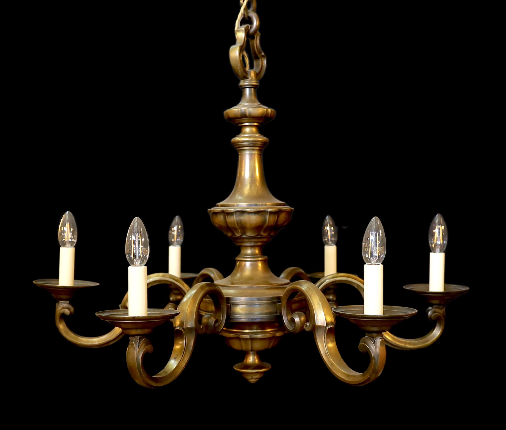 A 1920s-30s French bronze six light chandelier, height including rose 80cm. width 82cm